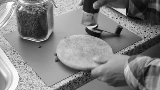 Person Manually Grinding Roasted Coffee Beans Home — Stock Video