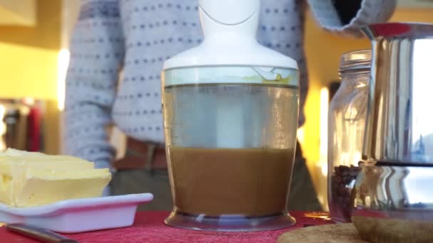 Person Making Keto Coffee Grass Butter Home — Stock Video