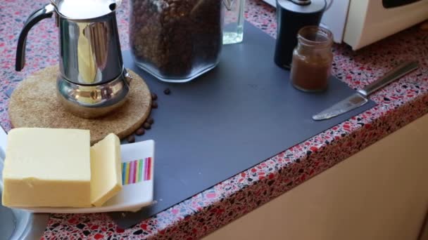 Person Making Keto Coffee Grass Butter Home — Stock Video