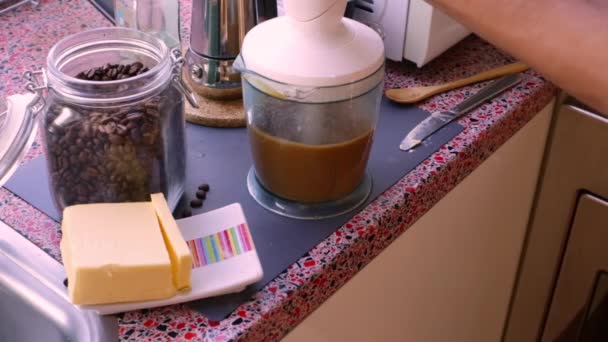 Person Making Healthy Bulletproof Coffee Butter Mct Oil — Stock Video