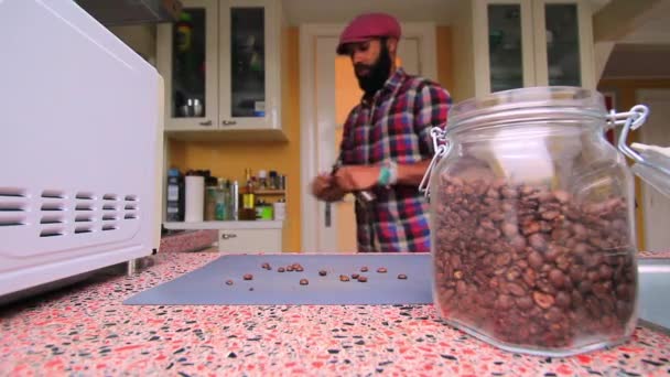 Person Manually Grinding Roasted Coffee Beans Home — Stock Video