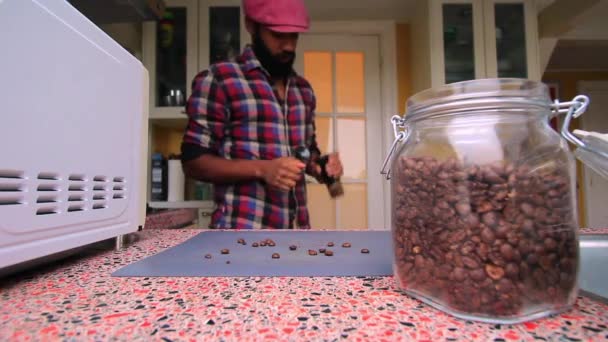 Person Manually Grinding Roasted Coffee Beans Home — Stock Video