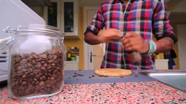 Person Manually Grinding Roasted Coffee Beans Home — Stock Video