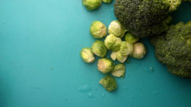 chef preparing brussel sprouts and broccoli
