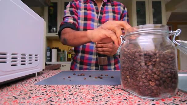 Person Manually Grinding Roasted Coffee Beans Kitchen — Stock Video