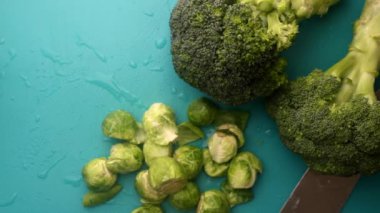 chef preparing brussel sprouts and broccoli