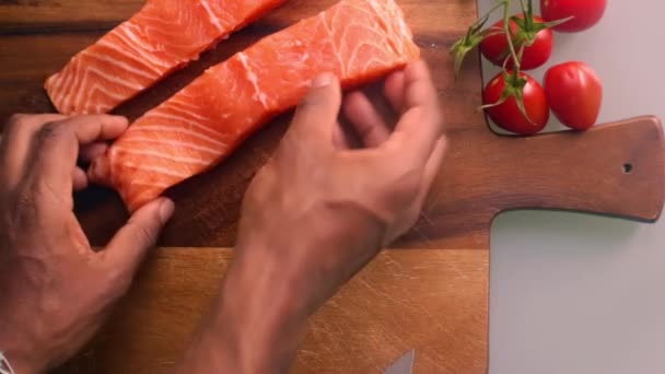 Person Preparing Salmon Broccoli Wooden Board Kitchen — Stock Video