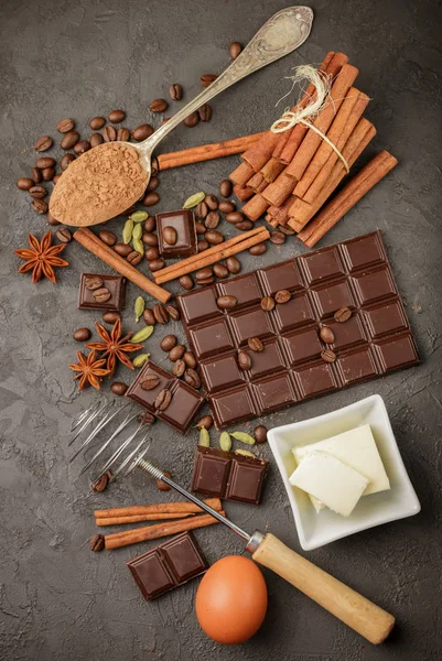 Ingredients for desserts - dark chocolate, cocoa, coffee, cinnamon, anise, cardamom