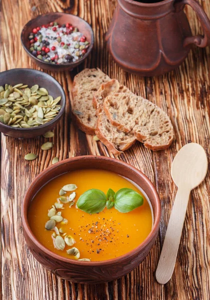 Delicious homemade pumpkin soup with spices and Basil