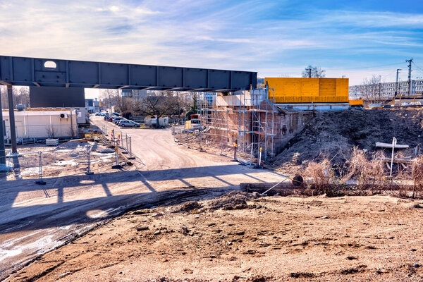 Construction site of a bridge, scaffolding and cladding, blue sky, Karlsruhe, Germany