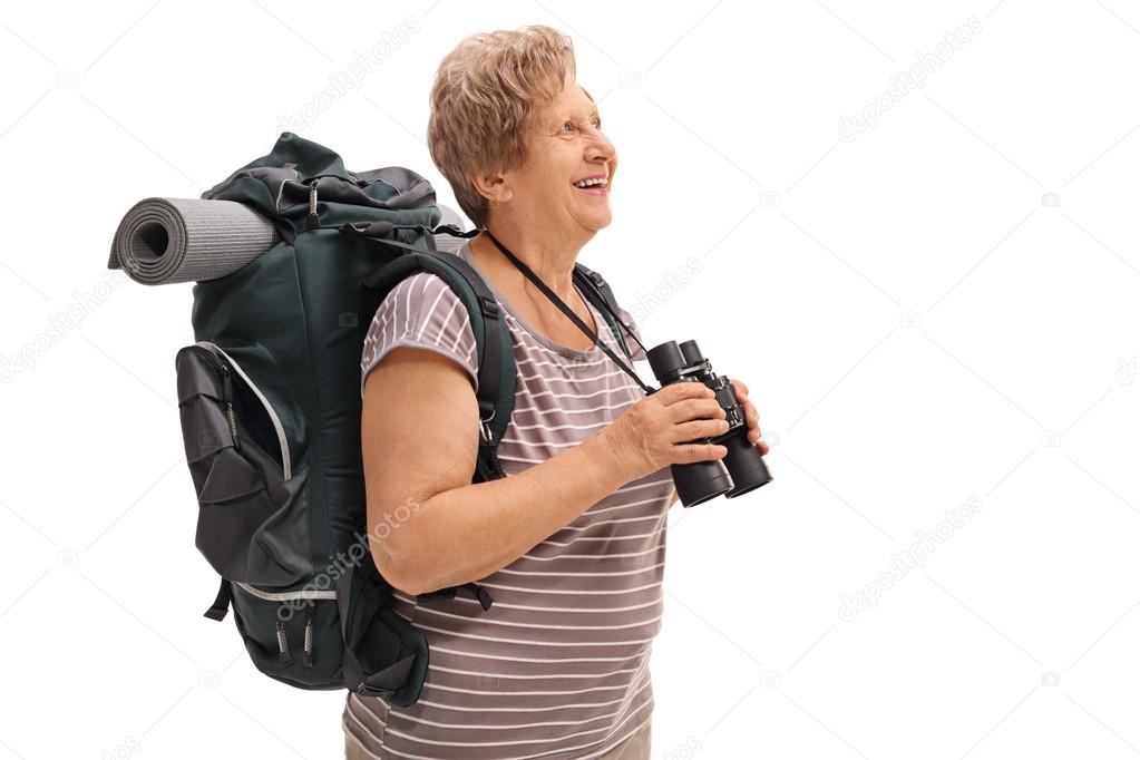 Mature female hiker looking in the distance