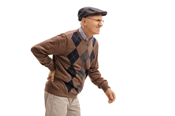 Пожилой человек испытывает боль в спине — стоковое фото