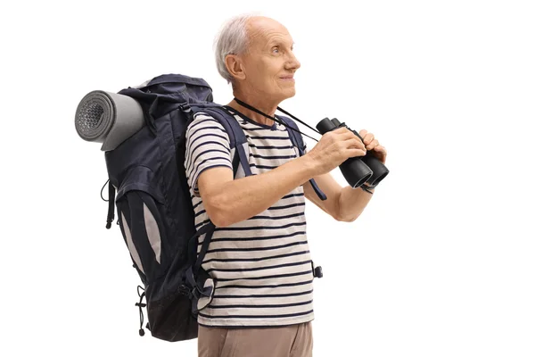 Mature male hiker looking in the distance — Stock Photo, Image