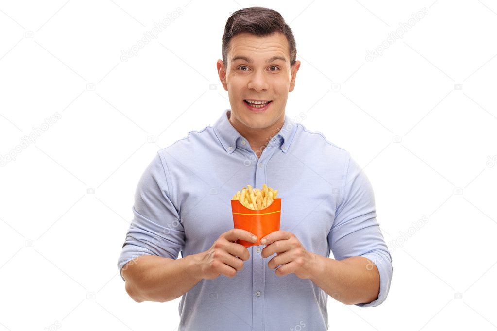 Happy man holding bag of fries