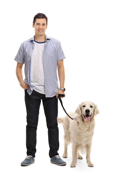 Ung man poserar med sin hund — Stockfoto