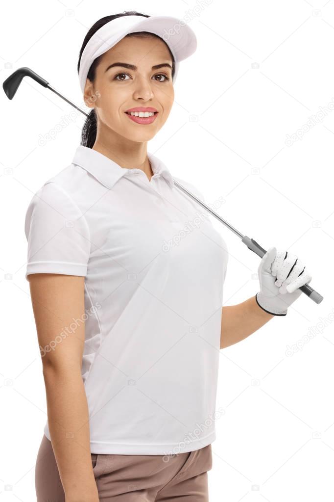 Female golfer posing with a golf club