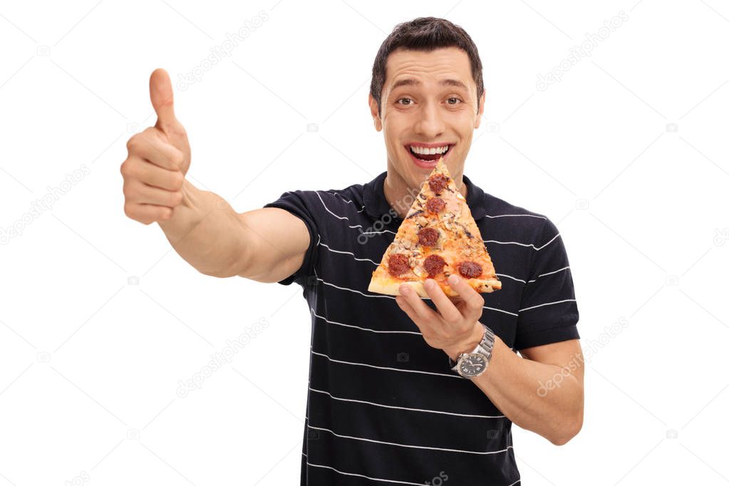 man eating slice of pizza and giving thumb up