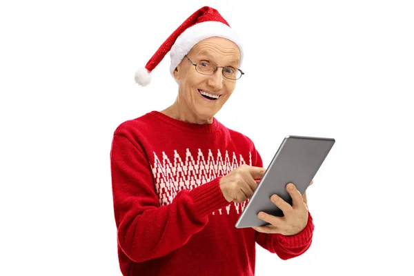 Radostné senior holding tablet — Stock fotografie