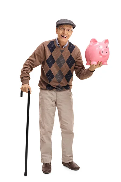 Cheerful senior with a cane and a piggybank — Stock Photo, Image