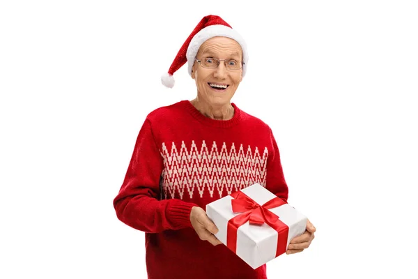 Uomo maturo dando un regalo di Natale — Foto Stock