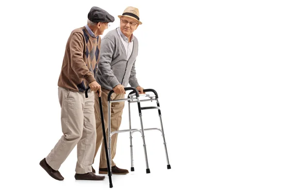 Älterer Mann mit Rollator und ein weiterer Mann mit Stock — Stockfoto