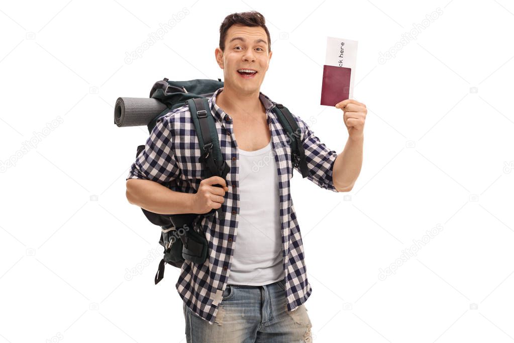 Cheerful tourist holding a passport