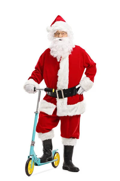 Santa claus pozowanie ze skuterem — Zdjęcie stockowe