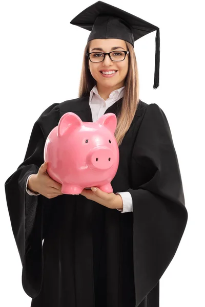 Gelukkig vrouwelijke afgestudeerde student met een spaarpot — Stockfoto