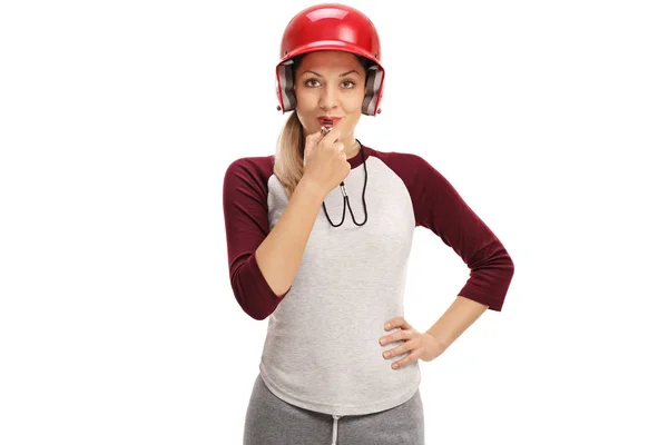 Female baseball coach blowing a whistle — Stock Photo, Image