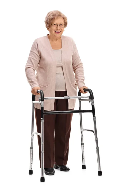 Yoyful mulher madura com um andador — Fotografia de Stock