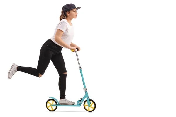 Chica montando un scooter — Foto de Stock