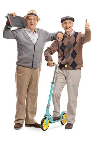 Mature man with skateboard and man giving thumb up — Stock Photo, Image