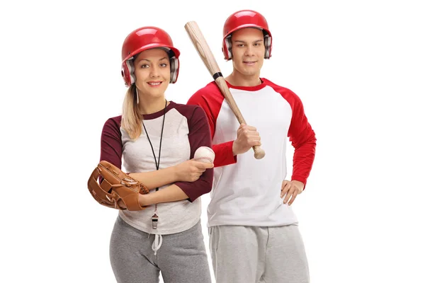Man and woman with baseball equipment — Stock Photo, Image