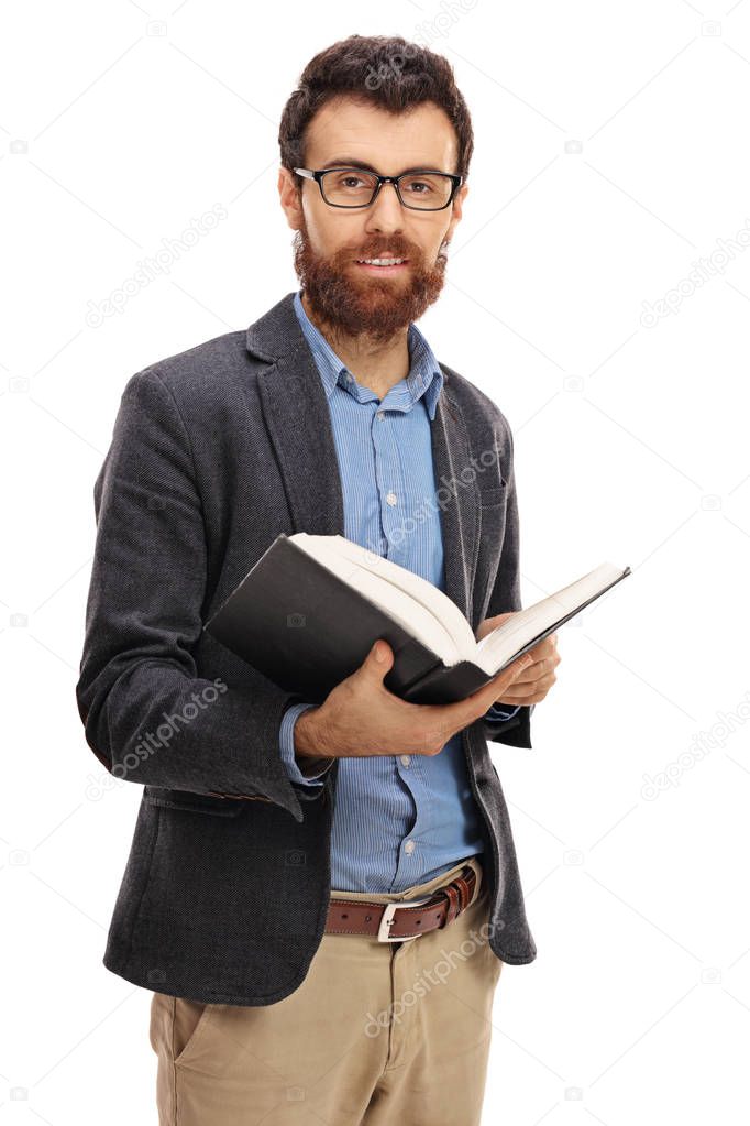 Bearded man holding a book