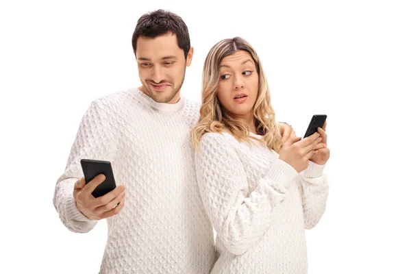 Jealous woman looking at her boyfriends phone — Stock Photo, Image