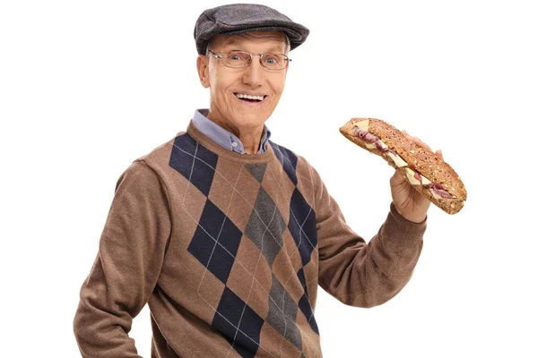 Vrolijke volwassen man met een sandwich — Stockfoto