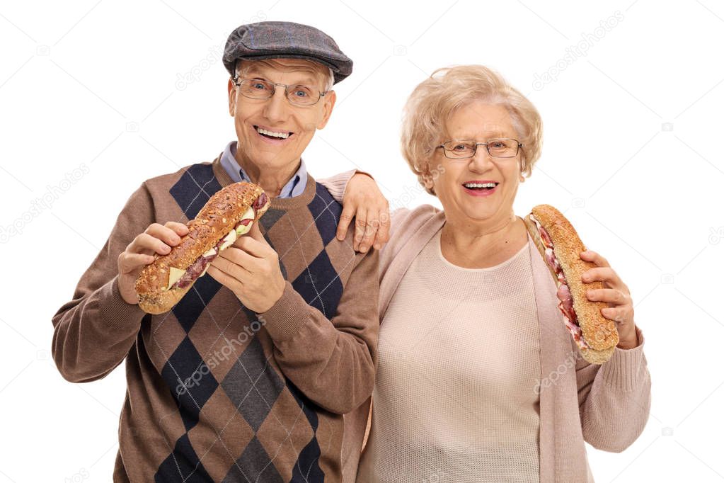 Seniors having sandwiches