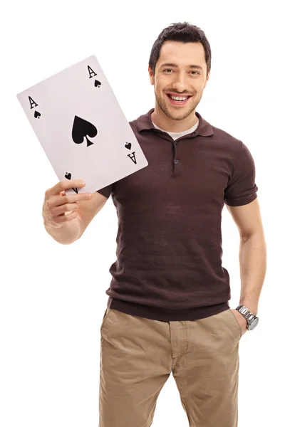 Happy guy with an ace of spades card — Stock Photo, Image