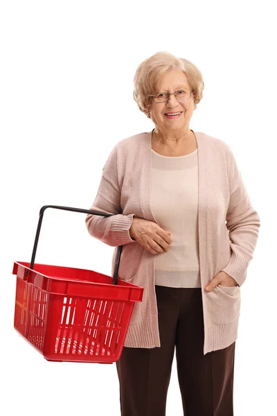 Mature woman with an empty shopping basket — Stock Photo, Image