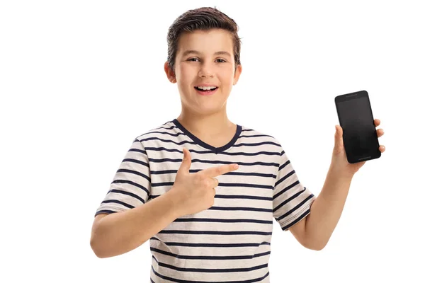 Joyful boy holding a phone and pointing — Stock Photo, Image