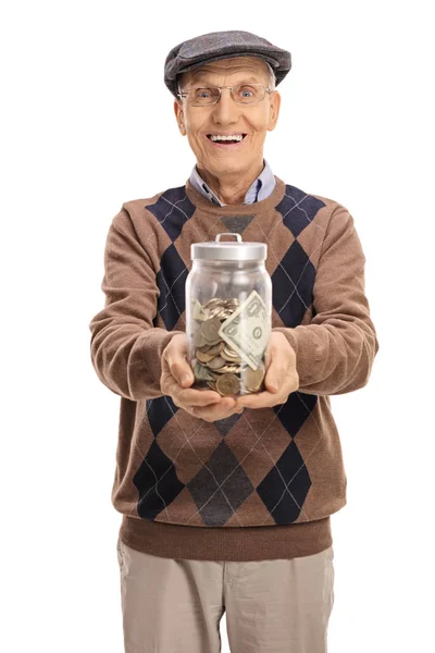 Vrolijke senior met een pot gevuld met geld — Stockfoto