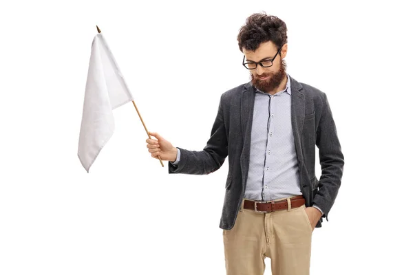 Hombre con la cabeza abajo sosteniendo una bandera blanca —  Fotos de Stock