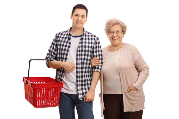 Homem com cesta de compras vazio e mulher idosa — Fotografia de Stock