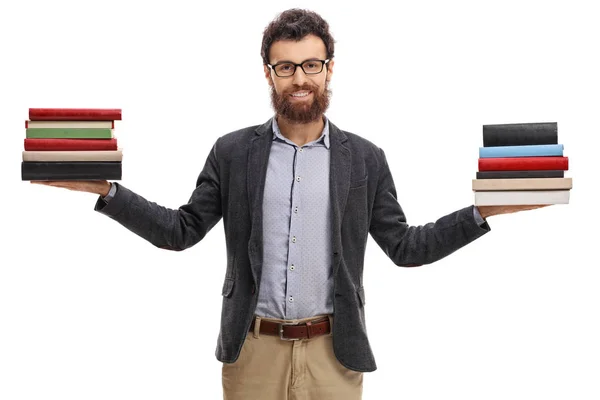 Professor com duas pilhas de livros — Fotografia de Stock
