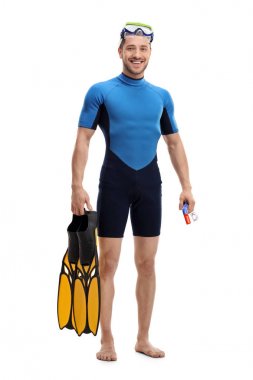 Şnorkel, palet ile bir wetsuit giyen