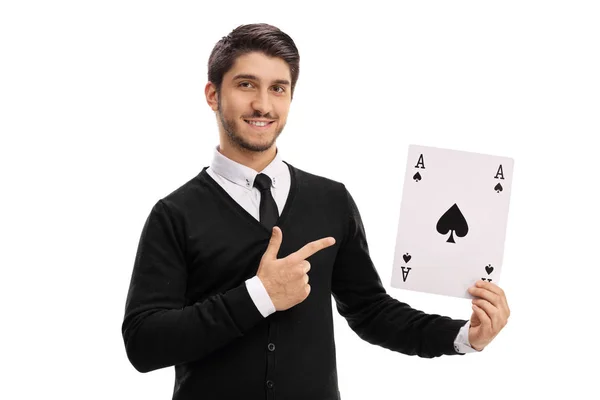 Hombre sosteniendo un as de cartas de espadas y señalando —  Fotos de Stock