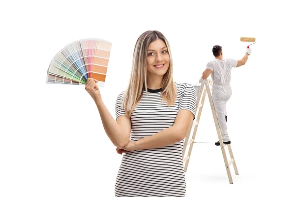 Nő a gazdaság egy színminta, egy festőművész, festmény — Stock Fotó