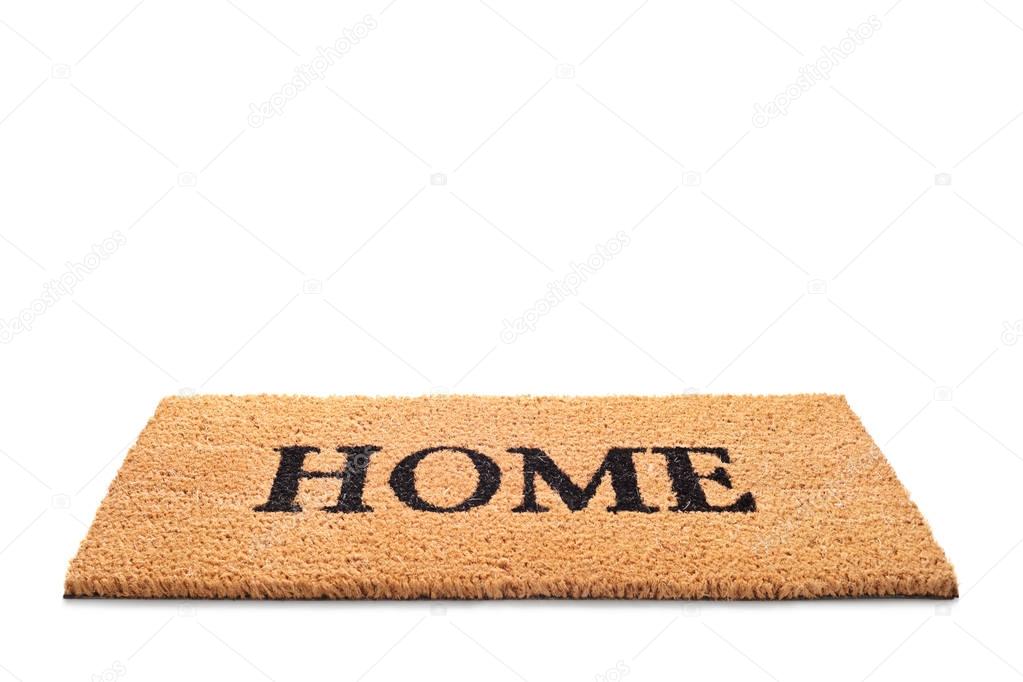 Doormat with the word home written on it