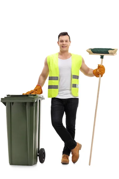 Waste collector with a broom and a garbage bin — Stock Photo, Image