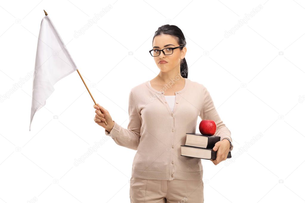 Disappointed female teacher holding a white flag